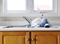 Clean dishes on kitchen sink Royalty Free Stock Photo