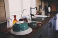 clean dishes in modern kitchen. Washing plates, glasses and tableware Royalty Free Stock Photo