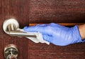 Clean and disinfect door handle. Germs, bacteria, Covid-19 Contamination Royalty Free Stock Photo