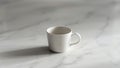 Minimalist White Coffee Mug on Marble Surface Royalty Free Stock Photo