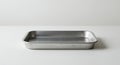 Clean, Empty, Rectangular Aluminum Baking Pan on a White Surface, Studio Shot Royalty Free Stock Photo
