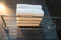 Clean folded bath towels in hotel bathroom Royalty Free Stock Photo