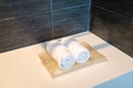 Clean folded face towels in hotel bathroom Royalty Free Stock Photo