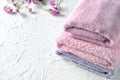 Clean folded towels on white table Royalty Free Stock Photo
