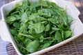 Clean food concept. Leaves of ripe juicy freshly picked organic baby spinach greens on the table. Healthy detox spring-summer diet Royalty Free Stock Photo