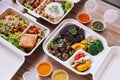 Clean food meal boxes: rice and rice berry with beef, salmon and chicken in various vegetables and salad for good health Royalty Free Stock Photo