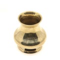 a clean golden indian brass vessel used as a water pot
