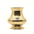 a clean golden indian brass vessel used as a water pot Royalty Free Stock Photo