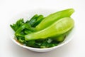 Clean green cucumbers on a plate. Vegetarian healthy food