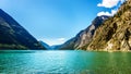 The clean green water of Seton Lake on the foot of Mount McLean near Lillooet Royalty Free Stock Photo