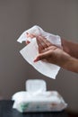 Clean hands with wet wipes