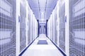 Clean industrial interior of a white server room with servers