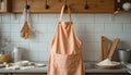 A clean kitchen setup showcasing an apron and baking ingredients, perfect for culinary and cooking enthusiasts Royalty Free Stock Photo