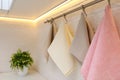 Clean kitchen towels hanging on wall indoors, closeup Royalty Free Stock Photo