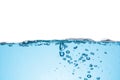 Clean light blue water wave and bubbles air isolated on white background Royalty Free Stock Photo