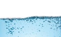 Clean light blue water wave and bubbles air isolated on white background Royalty Free Stock Photo