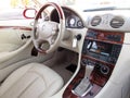 Clean lines, soft leather and premium wood mark details of mercedes coupe interior