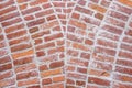 Clean masonry work in an old brick wall, as a patterned and weathered background