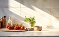 Clean minimal white marble kitchen countertop with cooking ingredients tomato asparagus bowl in morning sunlight on white square Royalty Free Stock Photo
