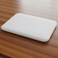 Minimalist White Rectangular Object on Wood Grain Surface Royalty Free Stock Photo