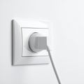 Electrical Plug Connected to a White Wall Socket Royalty Free Stock Photo