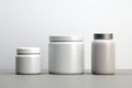 Clean mockups for cosmetic products. Three clean cans for cream, shampoo, conditioner, mask, gel. Mockups for hair, body