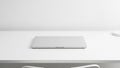Minimalist Laptop on White Desk Royalty Free Stock Photo