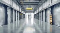 A clean, modern warehouse features gray and white walls, spacious rows of storage units, and a welcoming open door ready for use Royalty Free Stock Photo