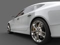 Clean modern white business car - rear wheel closeup shot Royalty Free Stock Photo