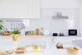 Clean new modern kitchen interior with homemade bread decoration on the table top for background Royalty Free Stock Photo