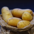 Clean New Potatoes In A Brown Paper Bag Royalty Free Stock Photo