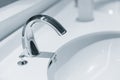 Clean new water tap or chrome faucet washbasin Royalty Free Stock Photo