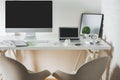 Clean office desk with computer and laptop Royalty Free Stock Photo