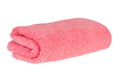 Clean pink towel neatly folded isolated on a white background Royalty Free Stock Photo