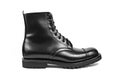 Clean and polished black boot from the side. Royalty Free Stock Photo