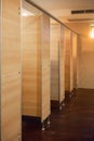 Clean public toilet room empty with big window and light from outside Royalty Free Stock Photo