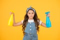 Clean quickly. Easy method. Household duty. Girl cute kid cleaning around. Protect sensitive skin. Kid cleaning at home Royalty Free Stock Photo