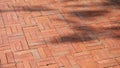 Clean red brick flooring, with some shadows Royalty Free Stock Photo