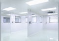 Clean room in manufacturing pharmaceutical plant, Green epoxy system flooring, Sandwich Panel, and double glass window, air Royalty Free Stock Photo