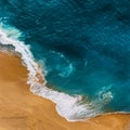 Clean sandy beach with yellow sand and blue sea, vertical photo. Aerial photography of a clean sandy beach. Royalty Free Stock Photo