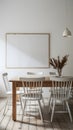 Clean, serene room with wooden table, white chairs, and blank canvas on neutral colored walls