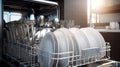 Clean and shiny dishes in a contemporary and well lit kitchen, revealed by an open dishwasher