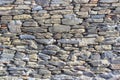 Clean shoot of contrast masonry stone wall made by turkish wall craftsman