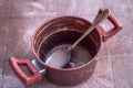 Clean shoot of red colored traditional cooking pot