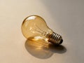 Light Bulb on Table Close Up - AI generated Royalty Free Stock Photo