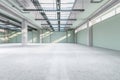 Clean spacious concrete warehouse garage interior. Space and design concept.