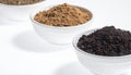 Variety of Soils and Potting Mixes in White Bowls on White Background Royalty Free Stock Photo