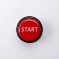 Red Start Button Ready for Action on a White Background Royalty Free Stock Photo