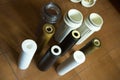 Changing filters in your home water purification system. Clean and used filters in comparison. Waterwater is very dirty