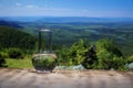 Clean water in a glass laboratory flask on wooden table on gren valley background. Ecological concept, the test of Royalty Free Stock Photo